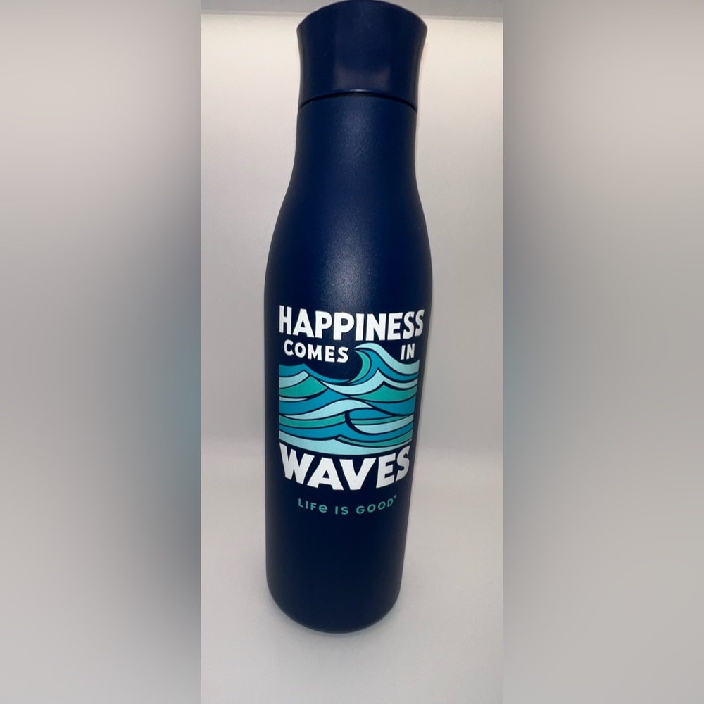 Insulated Tumbler with the text “Happiness comes in Waves” 25oz